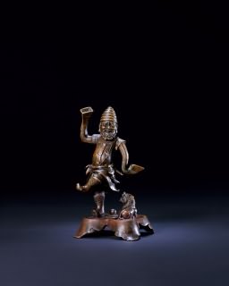 清中期 铜雕胡人戏狮摆件